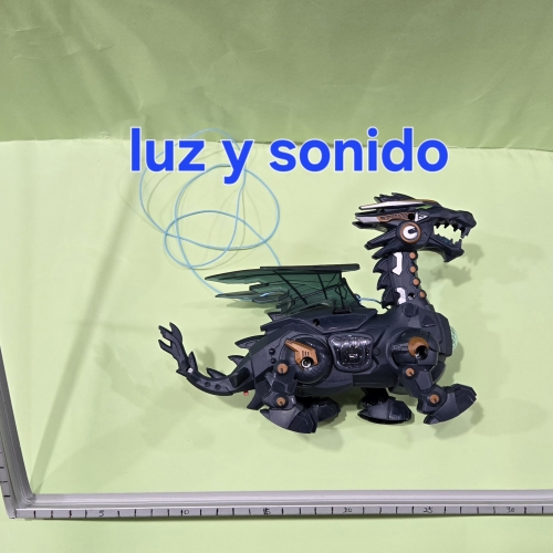 Dinosaurio con bolsa a pila con luz y sonido